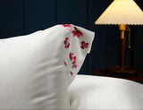 White Blossom Elegance: Pure Mulberry Silk Pillowcase with Red Floral Embroidery