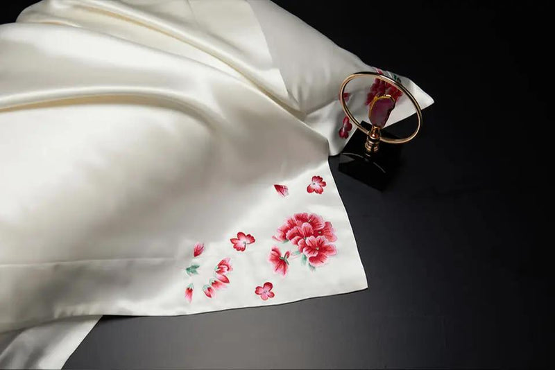 White Blossom Elegance: Pure Mulberry Silk Pillowcase with Red Floral Embroidery